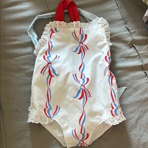 White Halter Swimsuit with Red and Blue Ribbon Design